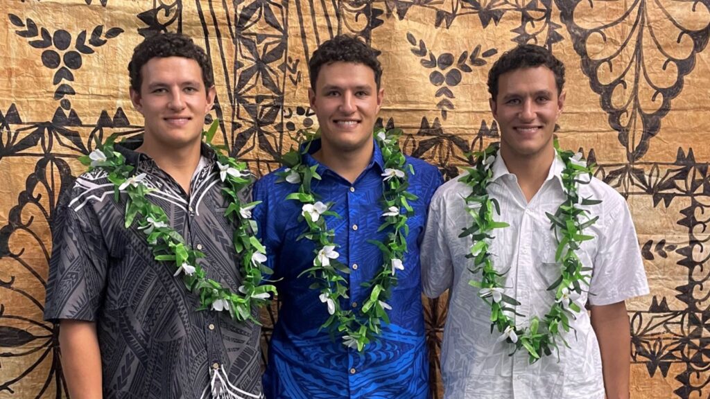 Identical triplets Max, Jackson and Cale Tu’inukuafe graduating with Law degrees from Te Herenga Waka—Victoria University of Wellington.