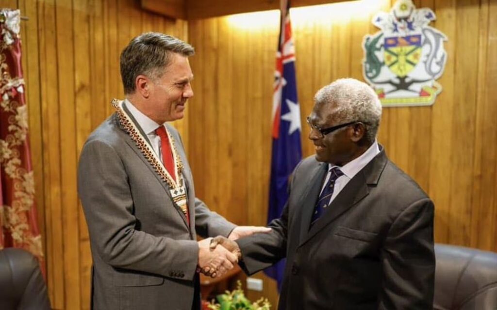 Manasseh Sogavare (right) and Australia's deputy PM Richard Marles at a meeting in Honiara. Photo Australia Department of Foreign Affairs and Trade