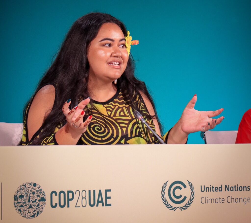 Brianna Fruean a Samoan climate justice activist speaks at the Womens Earth Climate Action Network press conference at COP28