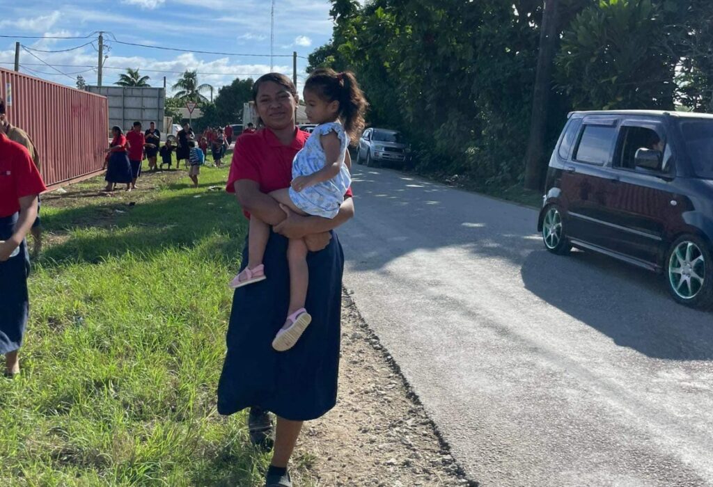 Students and teachers from ACTS Community School in Kolomotu'a evacuating toward safety during the tsunami alert. Photo ACTS Community School