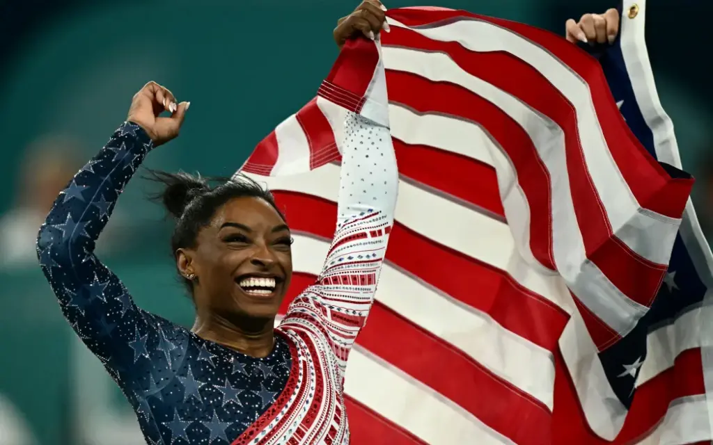 Simone Biles celebrates after team USA won the artistic gymnastics women's team final during the Paris 2024 Olympic Games at the Bercy Arena in Paris, on 30 July, 2024. Photo AFP