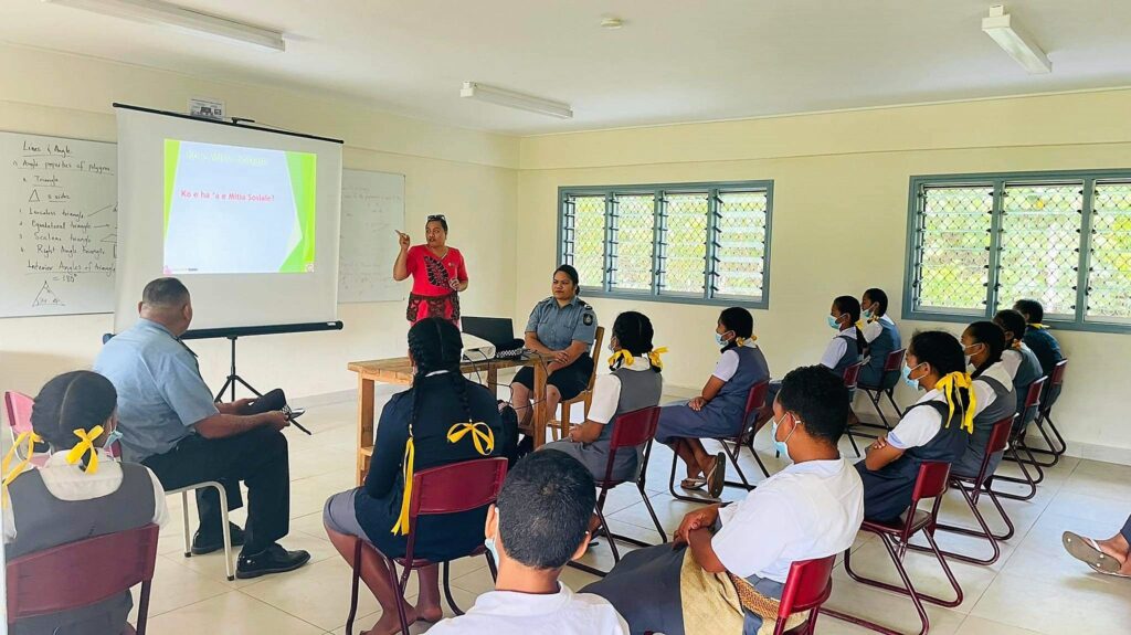 Tonga Police’s Serious Organised and Transnational Crime Unit presenting at one of its cyber security awareness programs at schools in Tonga in 2022