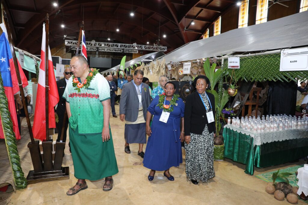 PM Huakavameiliku & Minister Viliami Latu take a tour of the Trade Show with Pacific Forum delegates