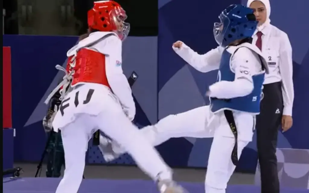 Fiji's Irene Mar, red, lost in the play-off for a bronze medal in the women's taekwondo K44, 57kg round of 16 on Saturday. Photo: Facebook / Sang Hyun Ra